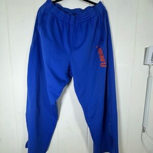 Nike Blue Joggers with Orange Logo